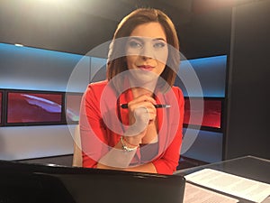 TV reporter at the news desk