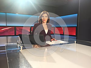 TV reporter at the news desk