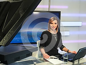 TV reporter at the news desk