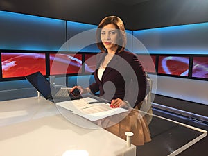 TV reporter at the news desk