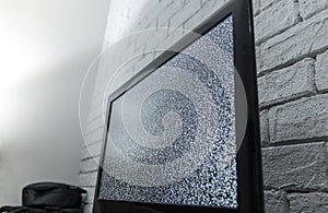 Tv screen with noise glitcher effect. No signal or no communication concept with rustic or loft style innterior.