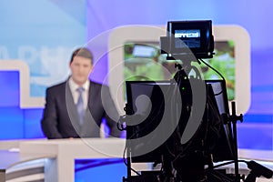 Tv studio camera recording reporter or anchorman. Live broadcasting