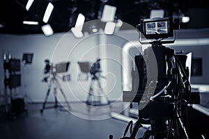 TV Studio live broadcasting.Recording show.TV NEWS program studio with video camera lens and lights