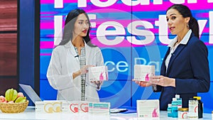 TV Talk Show Beauty Products Infomercial: Two Female Professionals Host and Expert Doctor Discuss photo