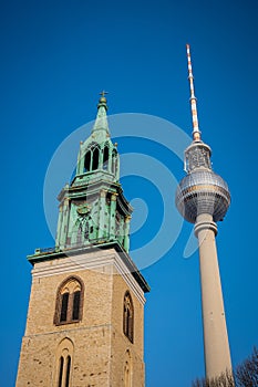 Tv tower in Berlin, on Alexanderplatz square on a clear spring day. Prominent tall building in Berlin, Germany. Looking from side