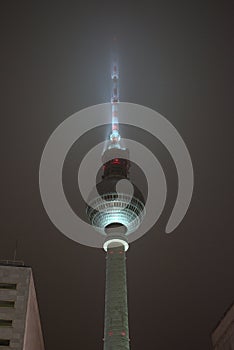 tv tower in berlin called Fernsehturm in the fog near Alexanderplatz