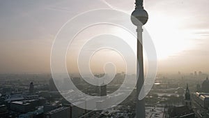 The TV Tower Fernsehturm landmark winter sunset at Alexanderplatz, Berlin