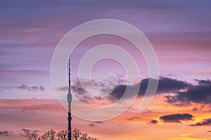 TV tower in Moscow at orange sunset. Television tower Ostankino.