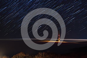 Tv tower under the startrail