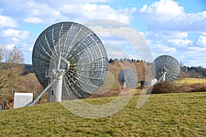 TV uplink satellites in a field in England