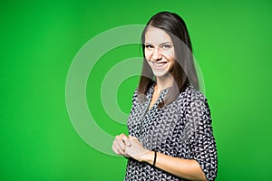 TV weather news reporter at work. News anchor presenting the world weather report. Television presenter recording in a green scree