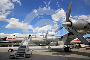 TWA Hotel`s 1958 Lockheed Constellation airplane in front of the landmark TWA Flight Center building designed by Eero Saarinen