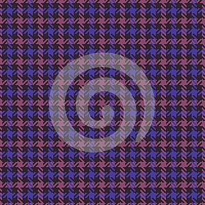 Tweed check plaid pattern herringbone in dark purple and pink. Seamless abstract check plaid graphic background texture for coat.