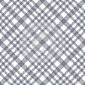 Tweed pattern seamless in grey and white. Textured hounds tooth herringbone tartan check plaid graphic for jacket, coat, skirt.