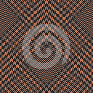 Tweed plaid pattern in brown and orange. Seamless hounds tooth glen tartan check plaid for coat, skirt, trousers, jacket.