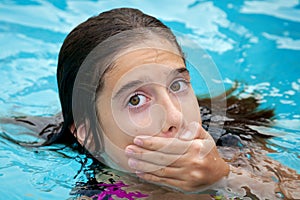 Tween Covering Her Mouth