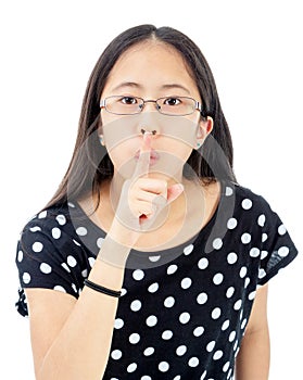 Tween Girl With a Silence Gesture