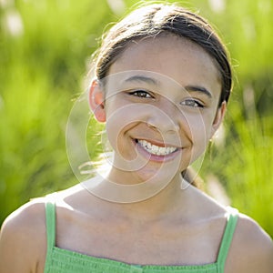 Tween Girl Smiling To Camera