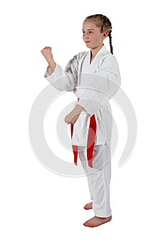 Tweenage girl going karate