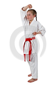 Tweenage girl going karate