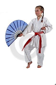 Tweenage girl going karate