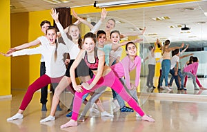 Tweens posing in dance school