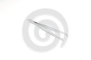 Tweezers of manicure set isolated on white background