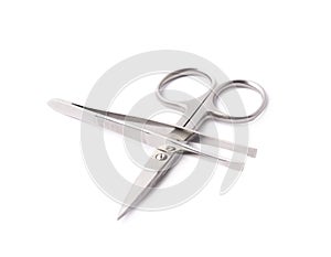 Tweezers and nail scissors isolated