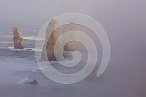 The Twelve Apostles along the Great Ocean Road, Victoria, Australia. Photographed at sunrise. Dawn fog