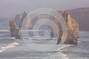 The Twelve Apostles along the Great Ocean Road, Victoria, Australia. Photographed at sunrise. Dawn fog