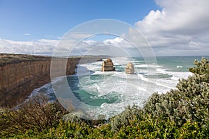 Twelve Apostles rock formation during a winter time with the sky full of clouds, Victoria, Australia