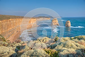 Twelve apostles rock pillars at Port Campbell national park viewed during sunset, Australia photo