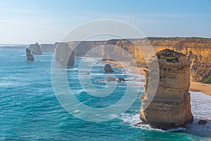 Twelve apostles rock pillars at Port Campbell national park viewed during sunset, Australia photo