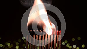 Twelve burning matchsticks as symbol month