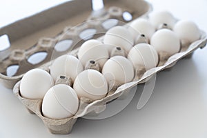 Twelve eggs in a carton package