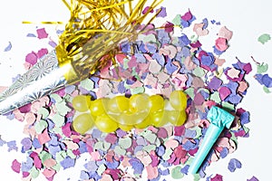 Twelve grapes and utensils for New Years photo
