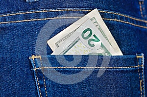 Twenty dolars inside of jeans back pocket