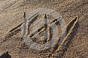 Twenty first century sign in sand