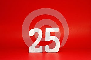 Twenty Five  25  white number wooden Isolated Red Background with Copy Space - New promotion 25% Percentage  Business finance Co