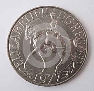 A twenty five pence British Commemorative coin from 1977