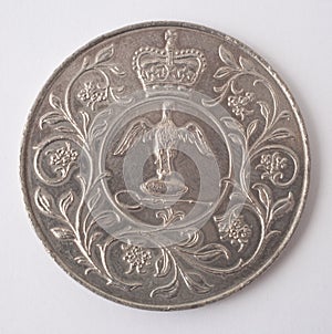 A twenty five pence British Silver Jubilee Commemorative coin from 1977