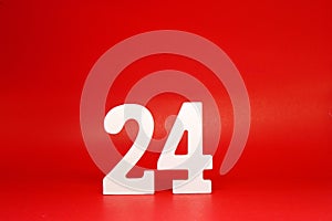 Twenty Four  24  white number wooden Isolated Red Background with Copy Space - New promotion 24% Percentage  Business finance Co