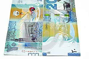 Twenty Kuwaiti dinars bill banknote 20 KWD features Seif Palace, a dhow ship, Kuwaiti pearl diver, traditional Kuwaiti dhow ship photo