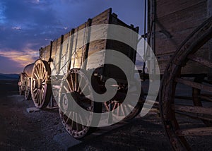 Twenty-mule team wagons at dusk