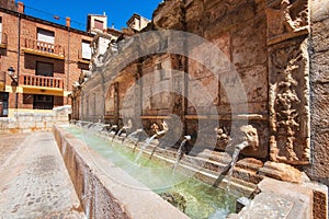 Twenty pipes fountain in Daroca village province of Zaragoza, Spain.