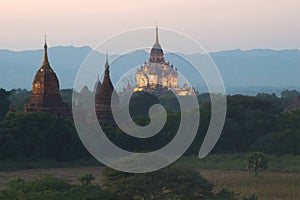 Twilight in ancient Bagan. A view of the top of the temple Gawdaw Palin. Myanmar photo