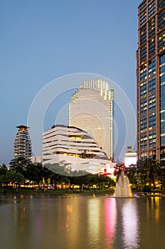 Twilight at Benjasiri Park in Bangkok.