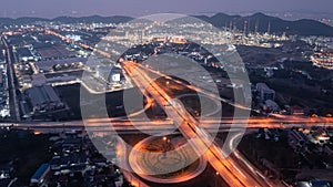 Twilight cityscape aerial view high way and ring road refinery industry area