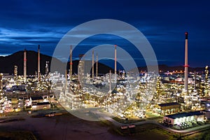 Twilight landscape refinery oil and gas at night aerial view