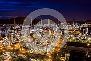 Twilight landscape refinery oil and gas at night aerial view